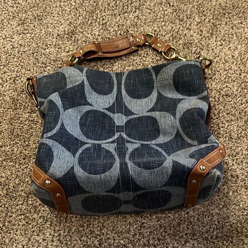 Excellent condition denim Coach purse. Stitching still in perfect condition.